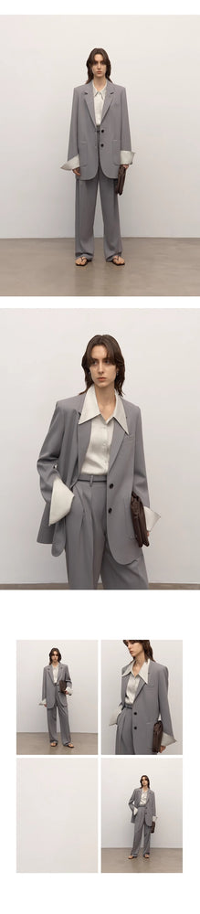 
                  
                    Heavy fine twill worsted wool, asymmetrical collar design, basic classic two-button suit
                  
                