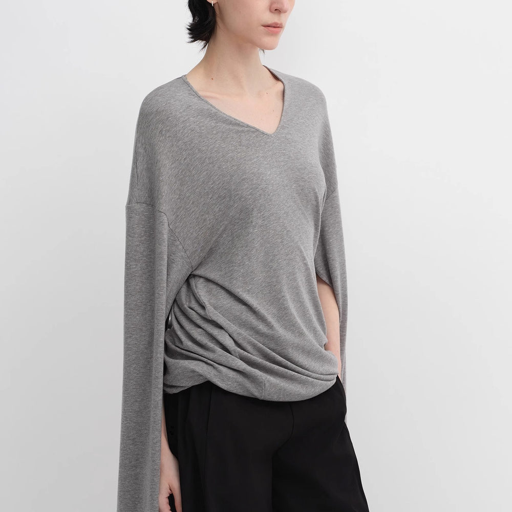 
                  
                    Machine washable Tencel wool V-neck two-wear elastic hem T-shirt bottoming shirt
                  
                