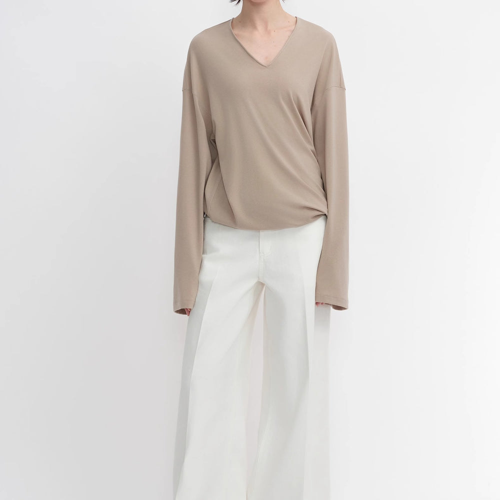 
                  
                    Machine washable Tencel wool V-neck two-wear elastic hem T-shirt bottoming shirt
                  
                